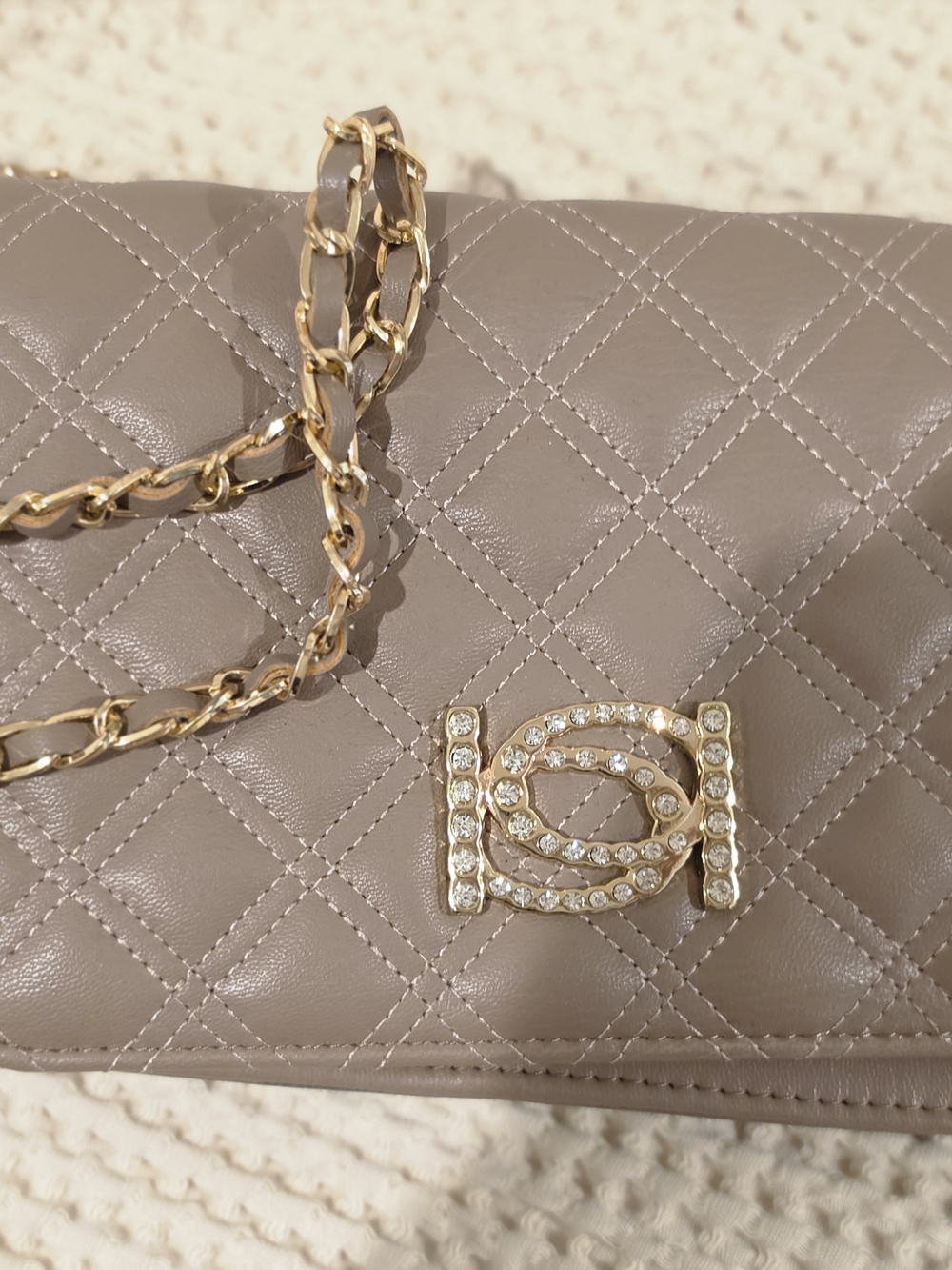 BeBe Quilted Taupe Leather Chain Shoulder Bag with Crystal Accent And Gold Meta